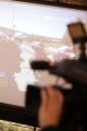 Kamea Regionalnej Telewizji Gorlickiej na tle pokazu slajdów